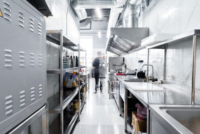 Technician performing commercial kitchen exhaust hood cleaning – ProServe Maintenance Group Technician performing commercial kitchen exhaust hood cleaning – ProServe Maintenance Group