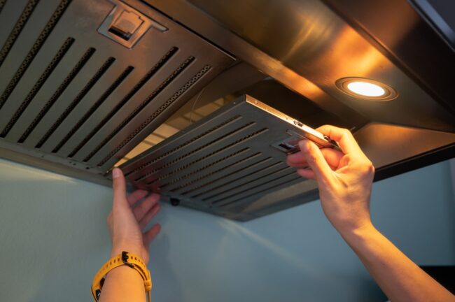 Kitchen exhaust system repair in progress by ProServe Mechanical technician Kitchen exhaust system repair in progress by ProServe Mechanical technician