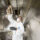 Technician performing kitchen exhaust hood cleaning at a commercial kitchen